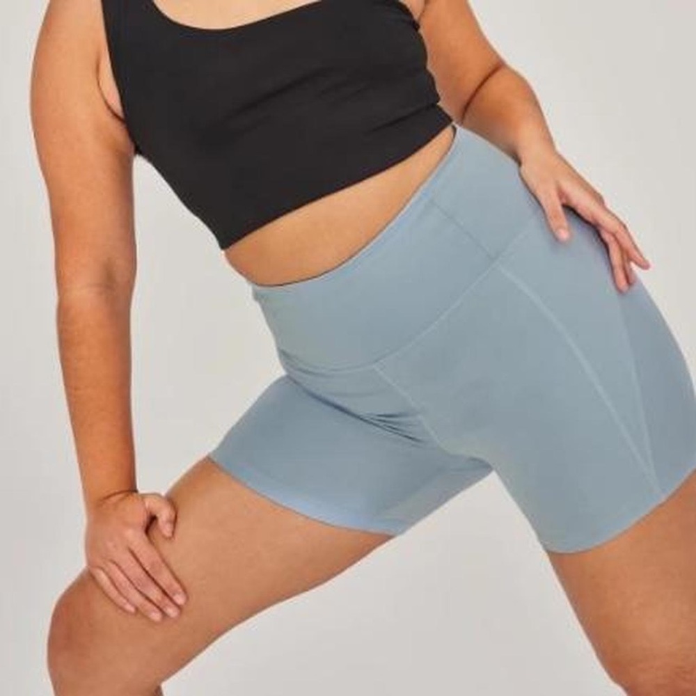 Girlfriend Collective High Rise Run short in Dew color